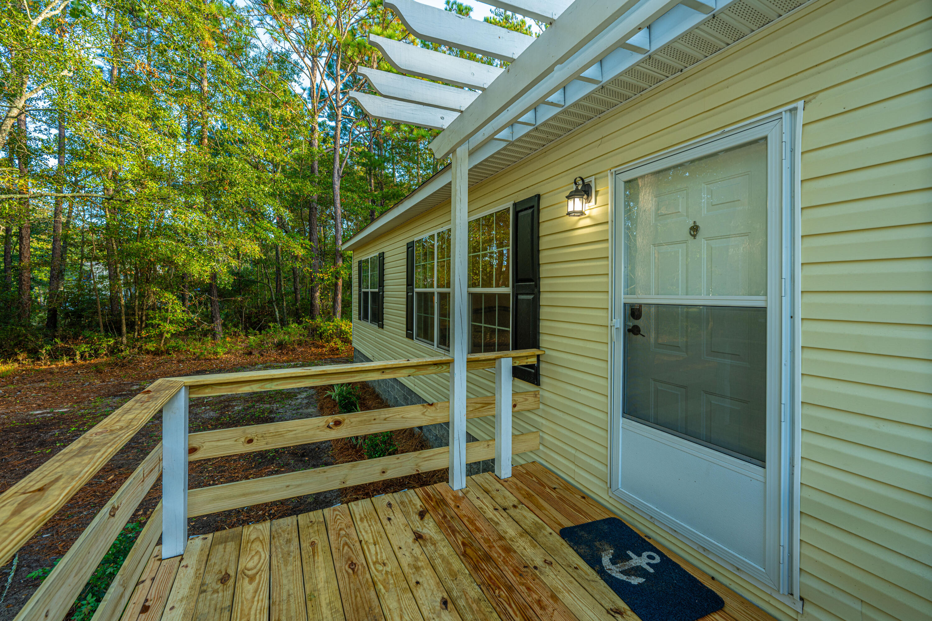237 Deer Ridge Court Huger, SC 29450 - Photo 2 of 25 237DeerRidgeCtFrontDeck