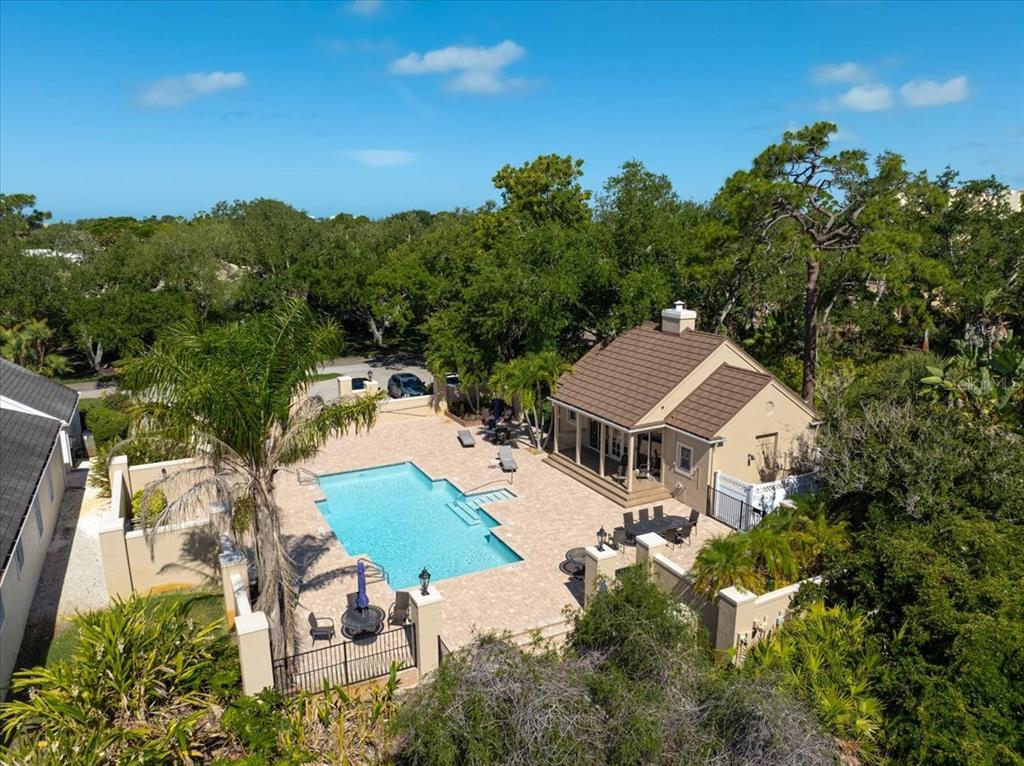 103 Bishopscourt Road Osprey, FL 34229 - Photo 30 of 55 an aerial view of house with yard and mountain view in back