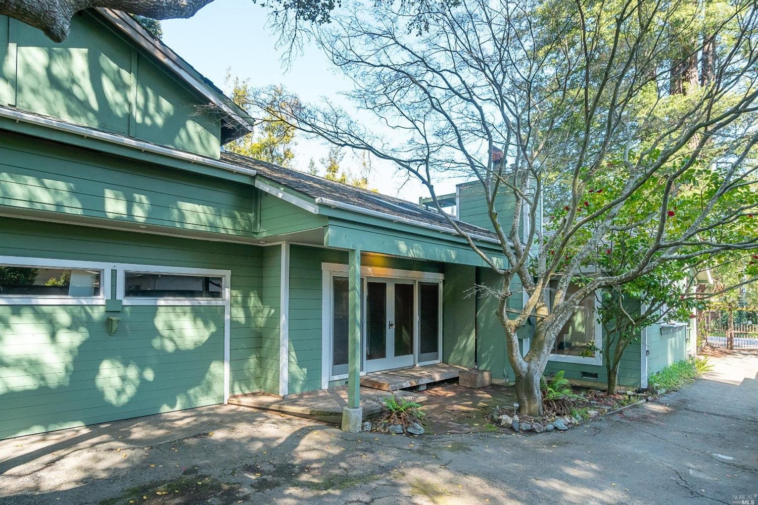 404 Spruce Street Mill Valley, CA 94941 - Photo 1 of 1 a front view of a house with garden
