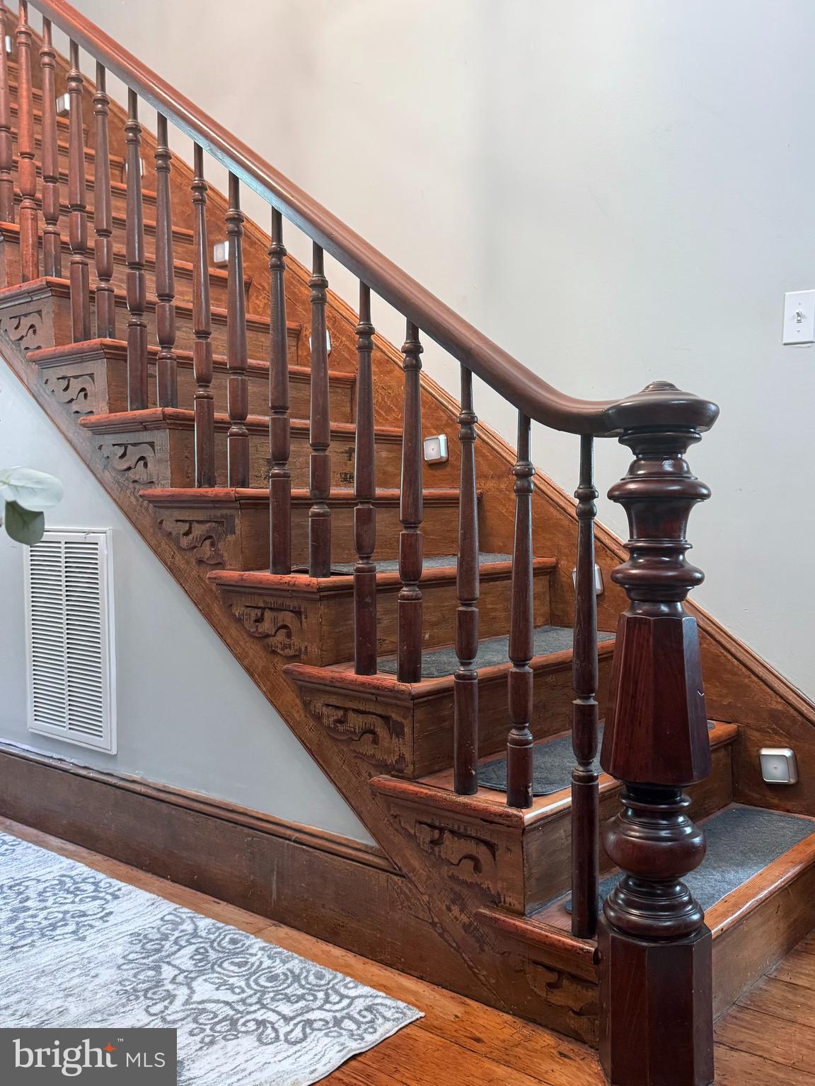 4941 Tulls Corner Road Marion Station, MD 21838 - Photo 4 of 7 a view of staircase with a rug