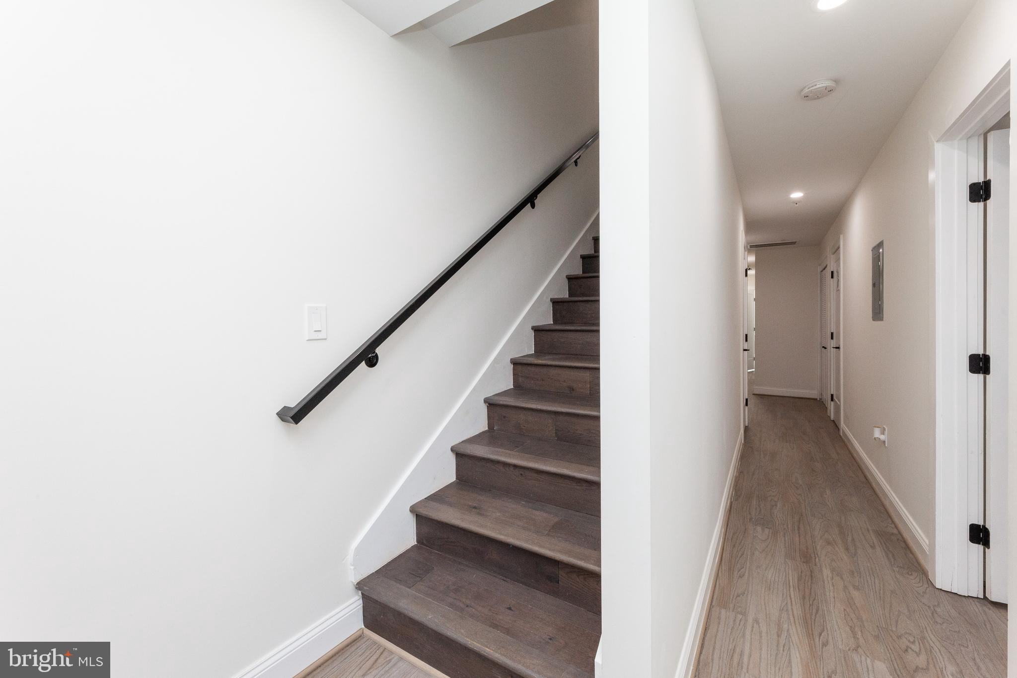 734 Kenyon Street Northwest, Unit 2 Washington, DC 20010 - Photo 15 of 24 a view of hallway with stairs