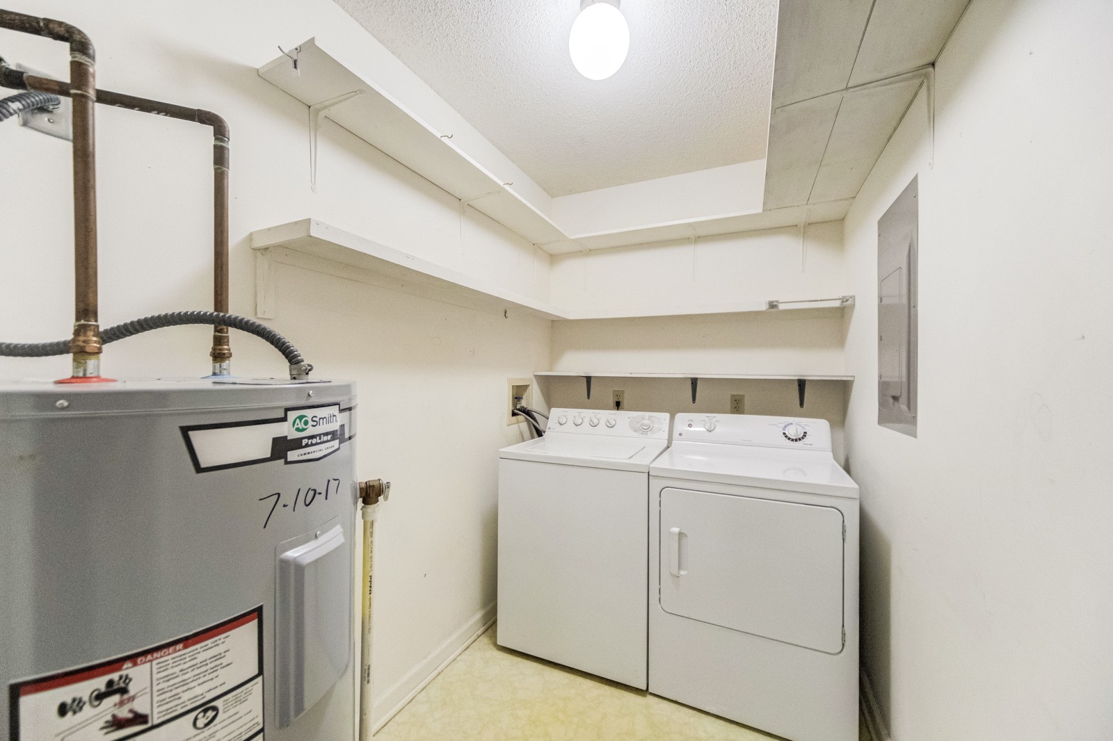 200 Sanders Ferry Road, Unit 1209 Hendersonville, TN 37075 - Photo 20 of 27 a view of storage and utility room with washer and dryer