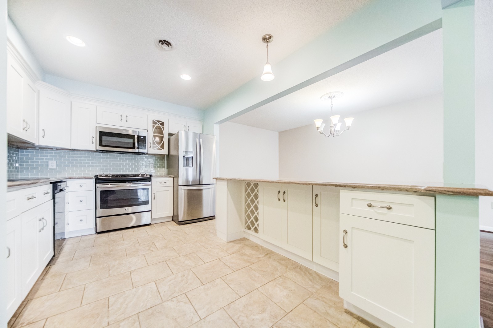 200 Sanders Ferry Road, Unit 1209 Hendersonville, TN 37075 - Photo 2 of 27 a large kitchen with cabinets stainless steel appliances and a counter space