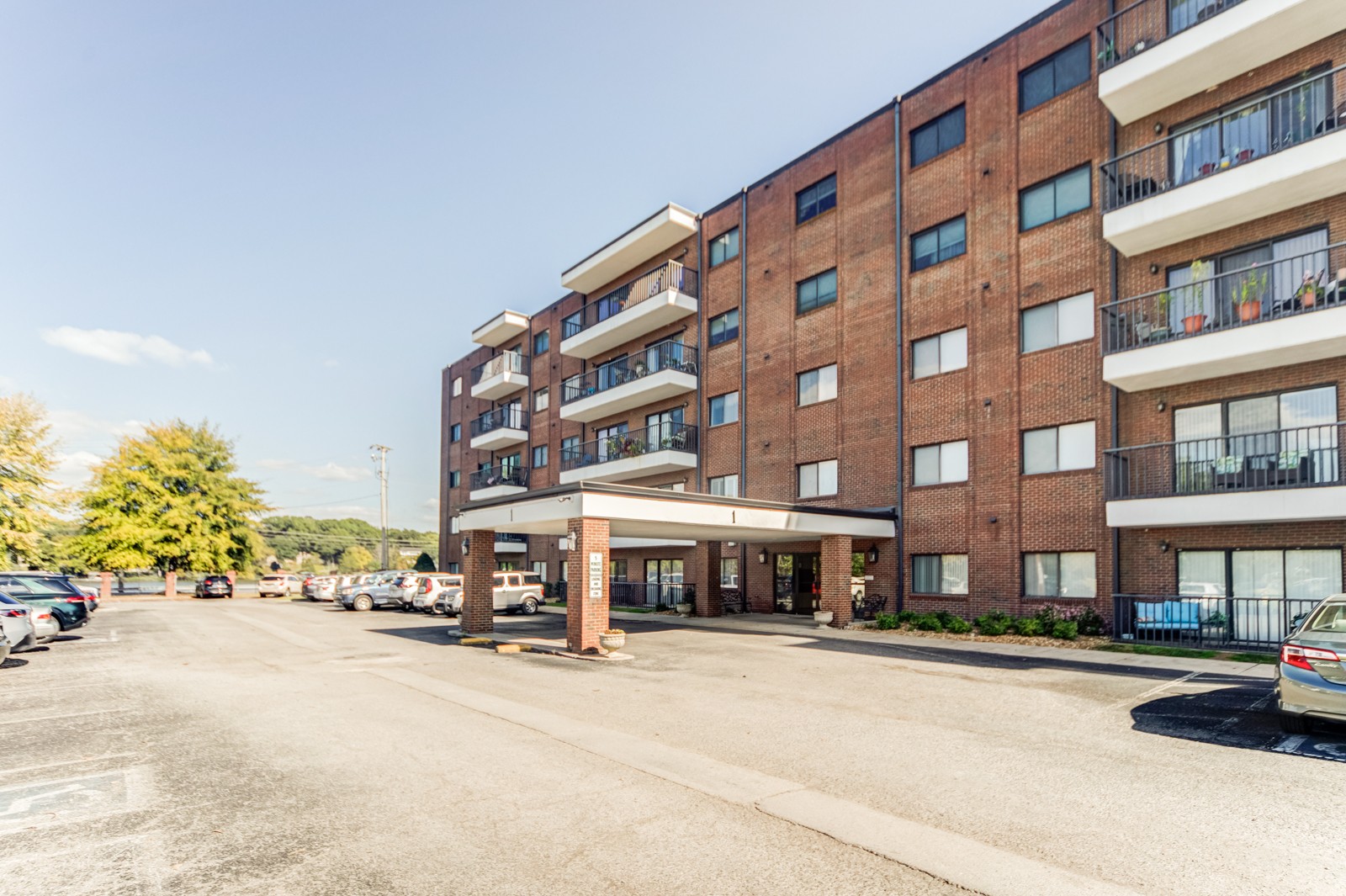 200 Sanders Ferry Road, Unit 1209 Hendersonville, TN 37075 - Photo 26 of 27 a city street lined with buildings and a street