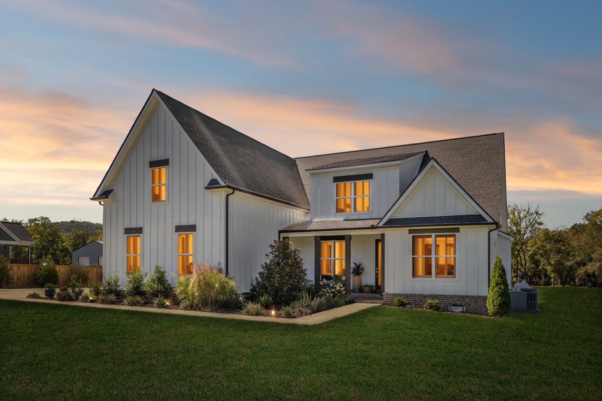 12725 North Milton Road Milton, TN 37118 - Photo 2 of 54 a front view of a house with a yard