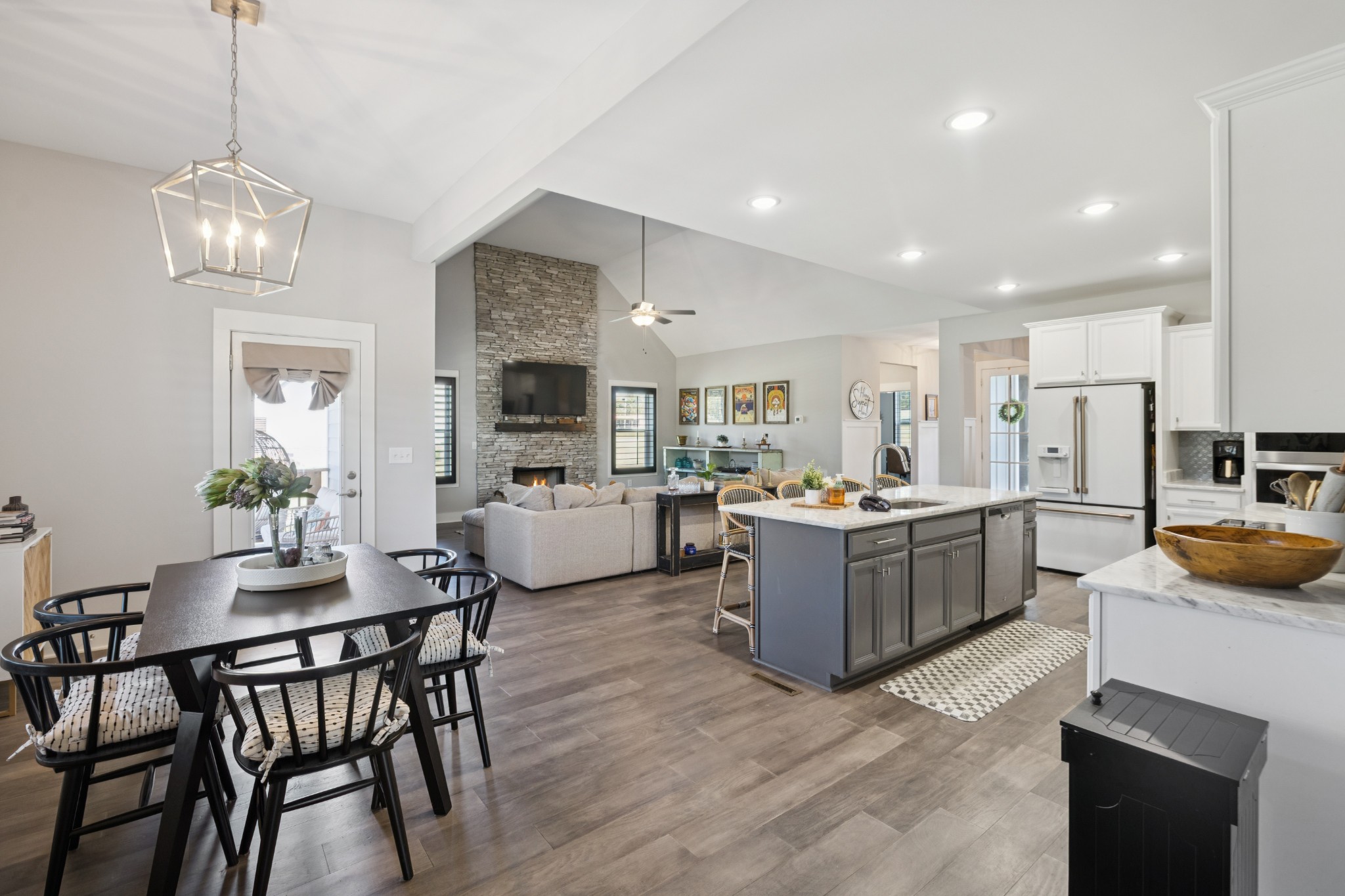 12725 North Milton Road Milton, TN 37118 - Photo 21 of 54 a living room with stainless steel appliances kitchen island granite countertop furniture wooden floor and a kitchen view
