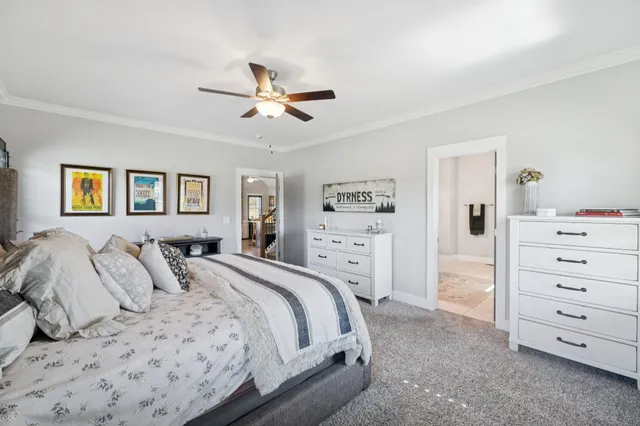 a bathroom with a double vanity sink mirror and shower