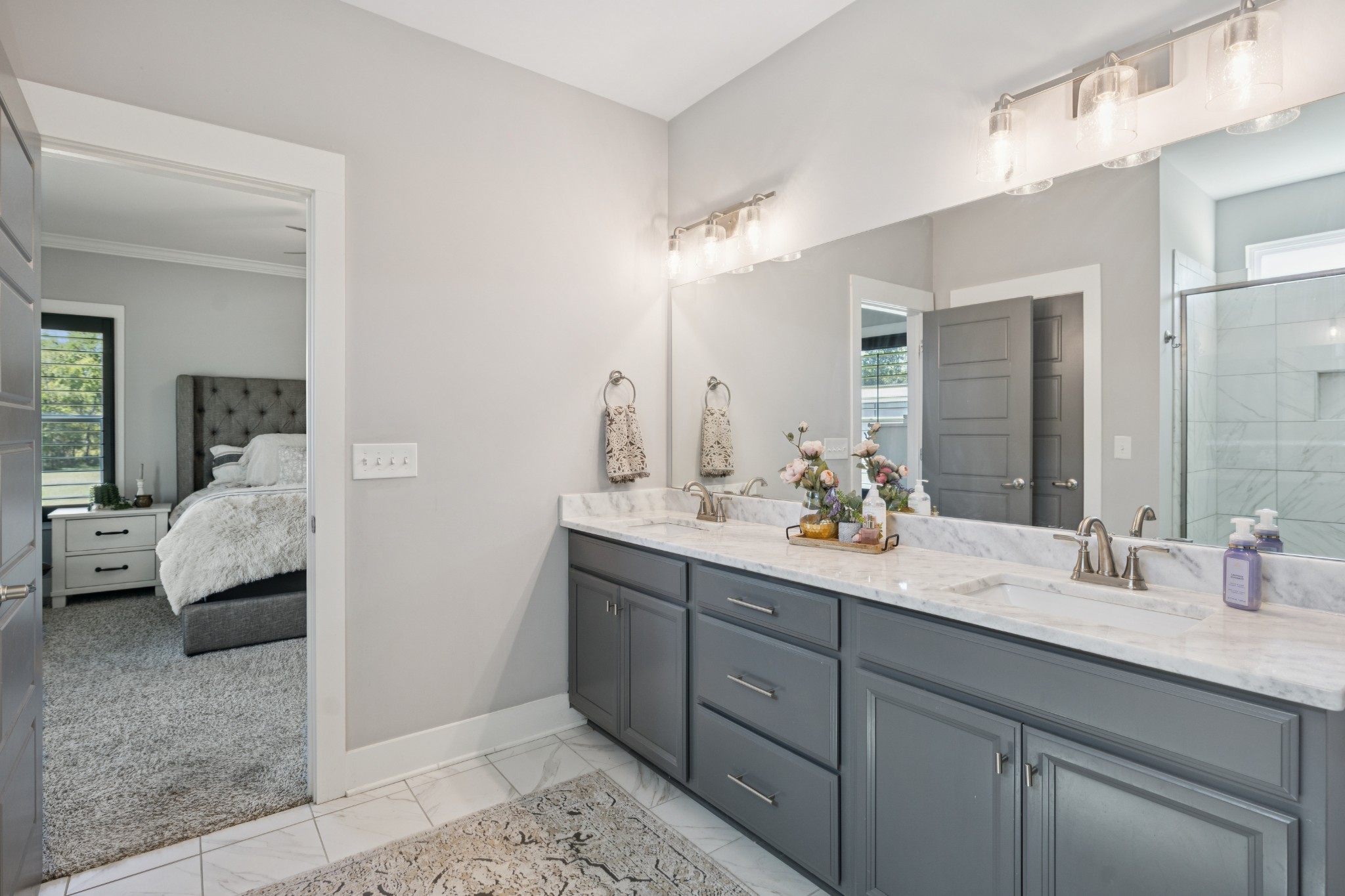 12725 North Milton Road Milton, TN 37118 - Photo 26 of 54 a en suite bathroom with double sink and a mirror