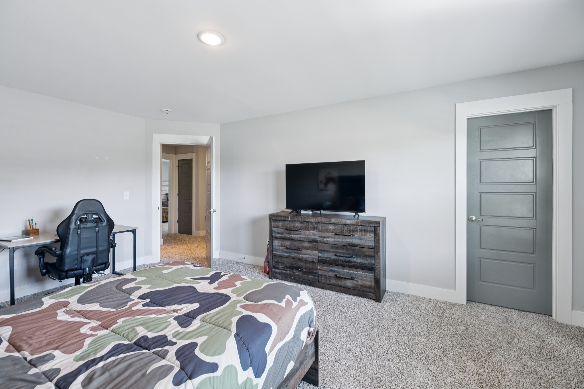 12725 North Milton Road Milton, TN 37118 - Photo 34 of 54 a bedroom with a bed and a television