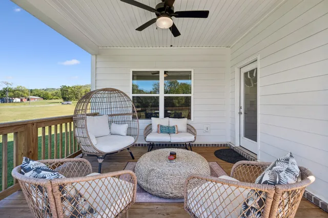 a view of a chairs on the roof deck