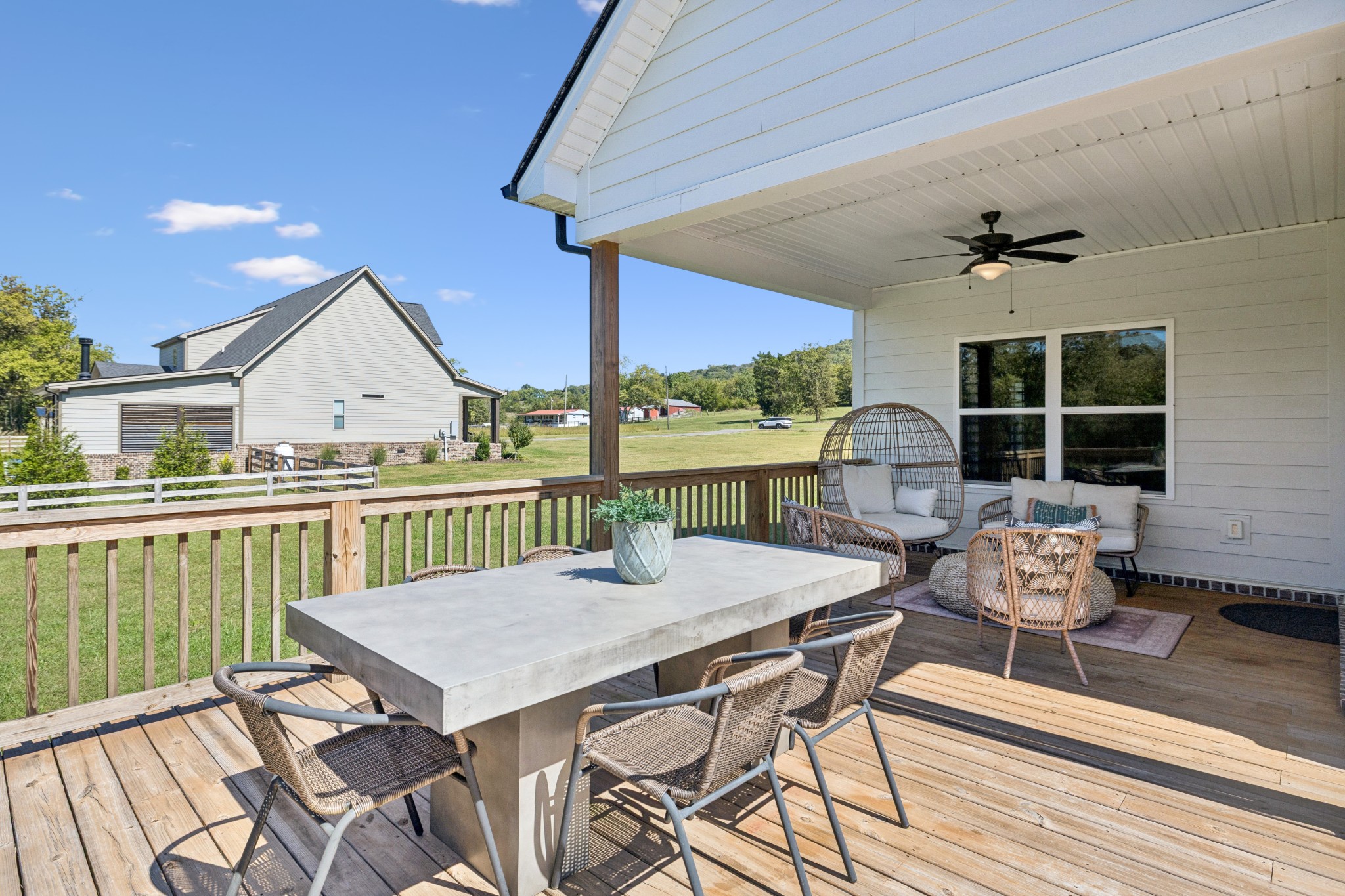 12725 North Milton Road Milton, TN 37118 - Photo 40 of 54 a view of a patio with a table and chairs