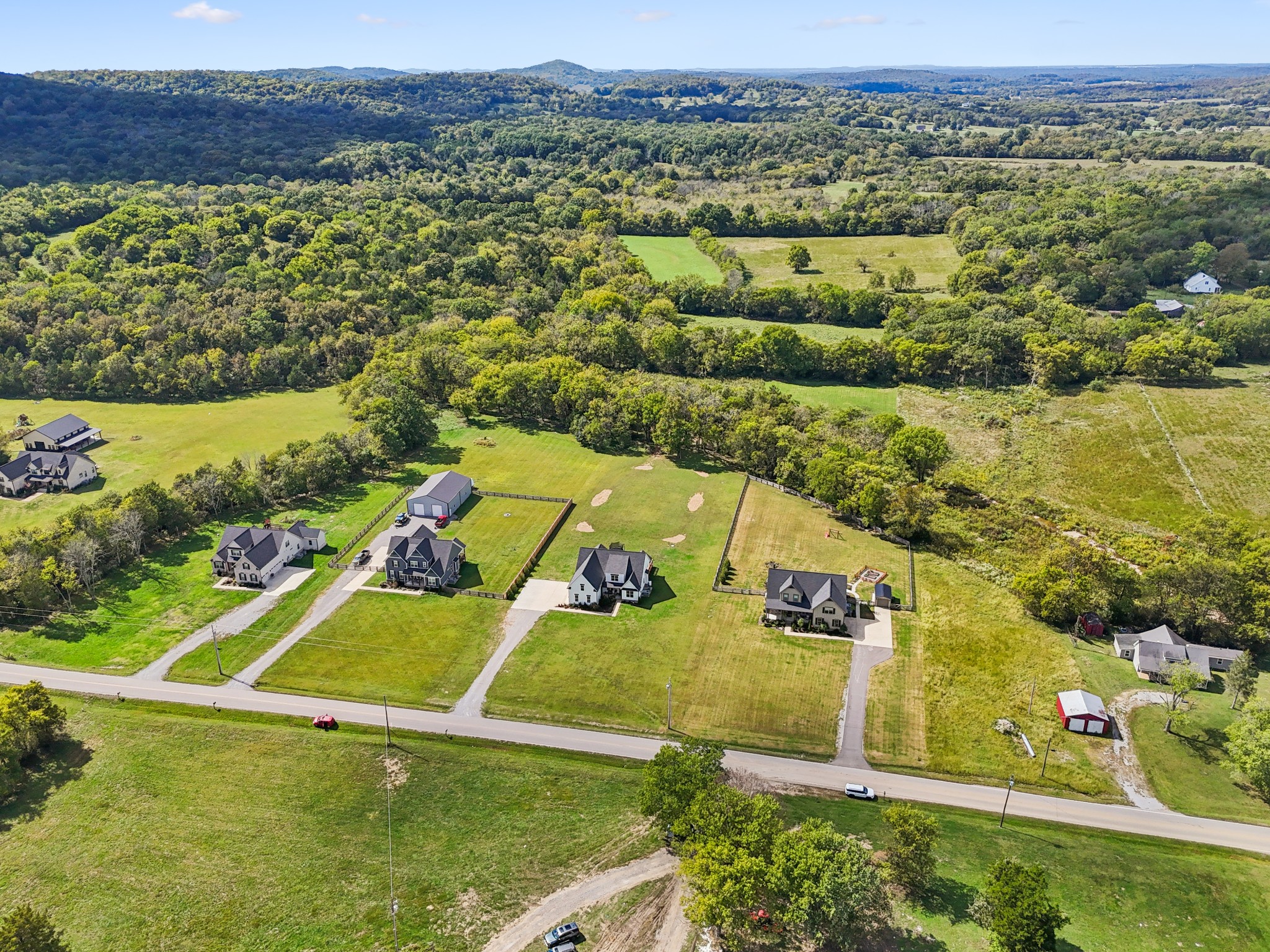 12725 North Milton Road Milton, TN 37118 - Photo 46 of 54 an aerial view of residential houses with outdoor space