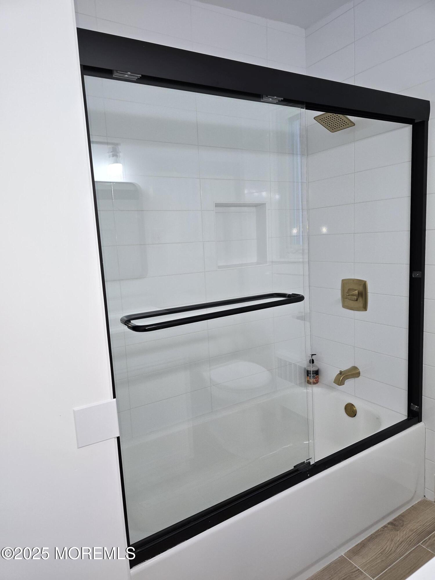 142 South Street, Unit 10B Red Bank, NJ 07701 - Photo 7 of 9 a bathroom with a shower and a mirror