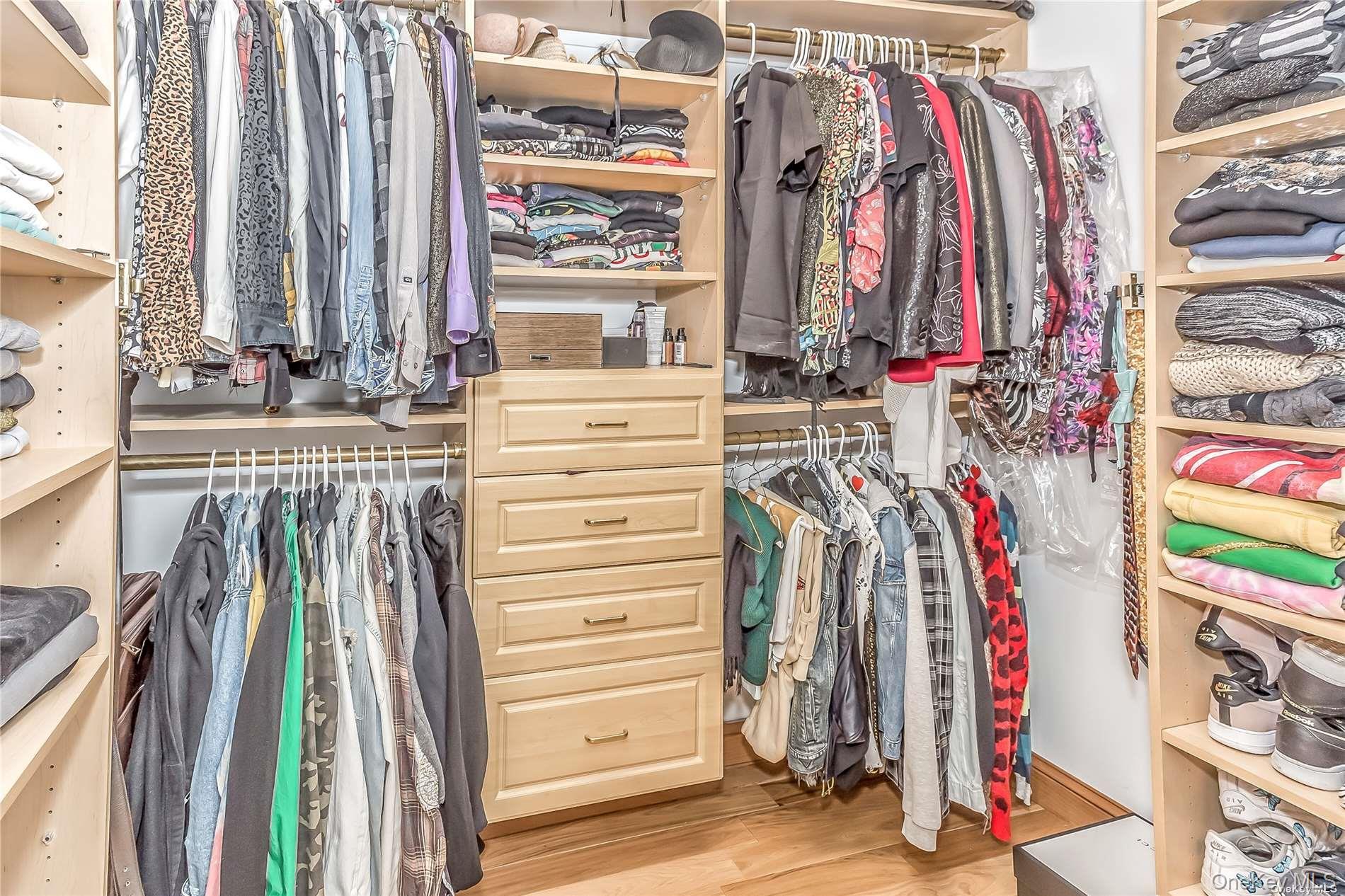 127 Maple Boulevard Long Beach, NY 11561 - Photo 15 of 22 a view of walk in closet with clothes