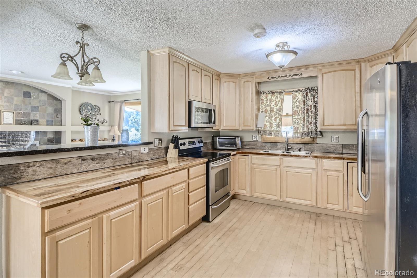 13340 South Perry Park Road Larkspur, CO 80118 - Photo 8 of 28 Gallery Image 8