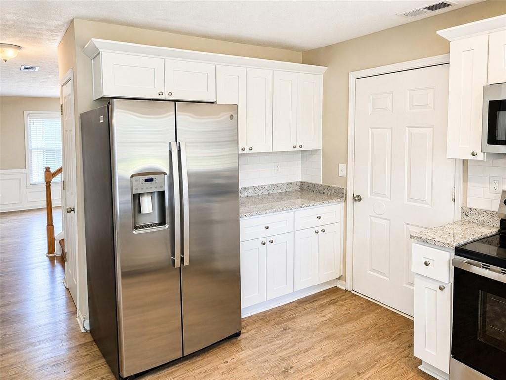 3925 Riversong Drive Northwest Suwanee, GA 30024 - Photo 10 of 28