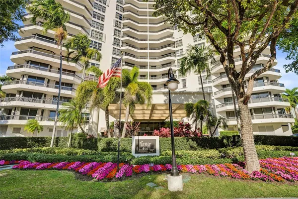 a view of building and yard