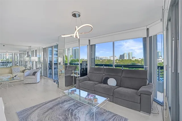 a kitchen with stainless steel appliances a refrigerator stove and microwave