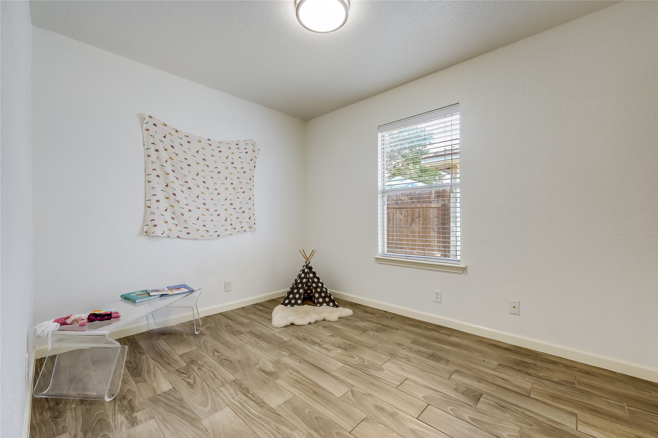 4510 Secure Lane Austin, TX 78725 - Photo 21 of 24 a view of workspace with wooden floor