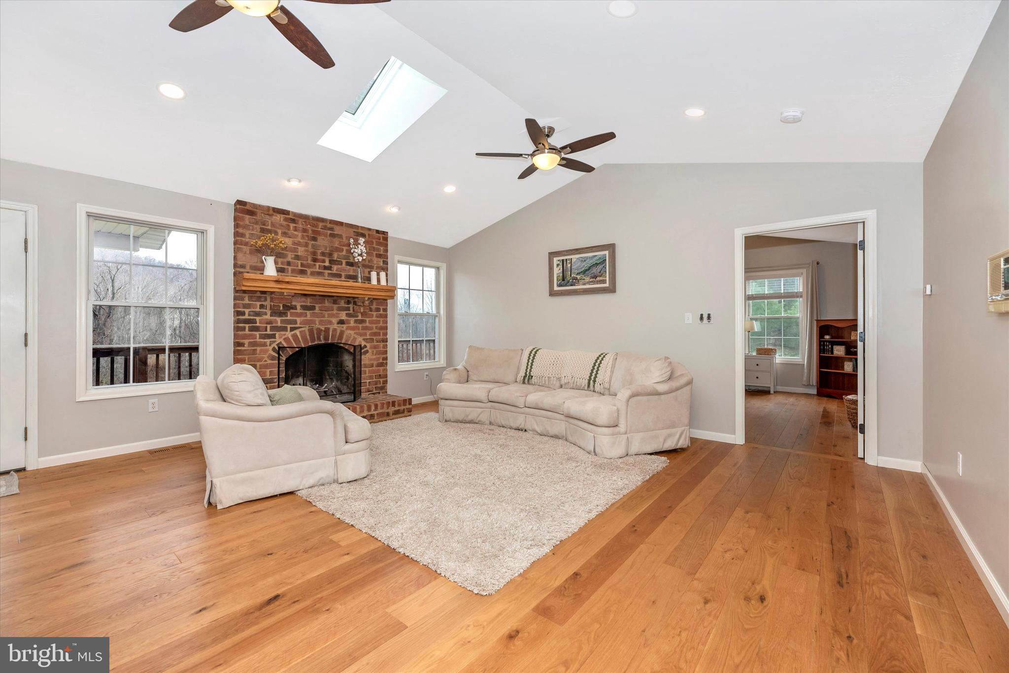 10831 Easterday Road Myersville, MD 21773 - Photo 26 of 49 Open Living Room with Wood Burning Fireplace!!