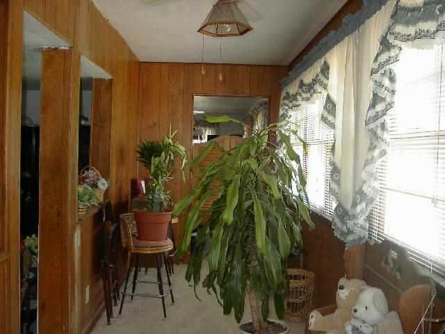 77 North Dakota Road Ridott, IL 61067 - Photo 4 of 8 a view of entryway with wooden floor