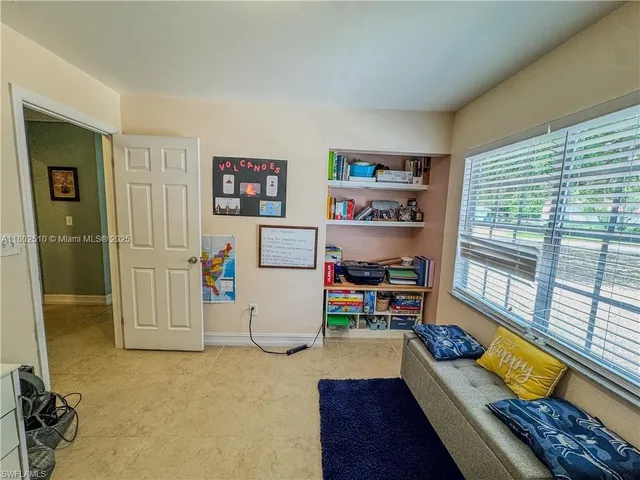 a room with furniture and a gate