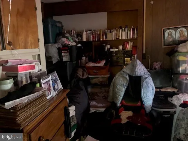 a bathroom with a toilet sink and curtain