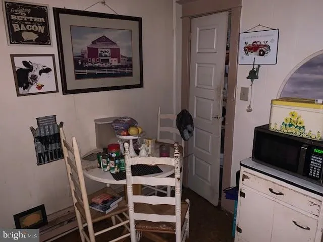 a view of a workspace with furniture