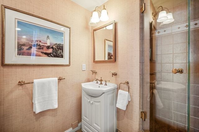 a view of swimming pool with outdoor seating and trees