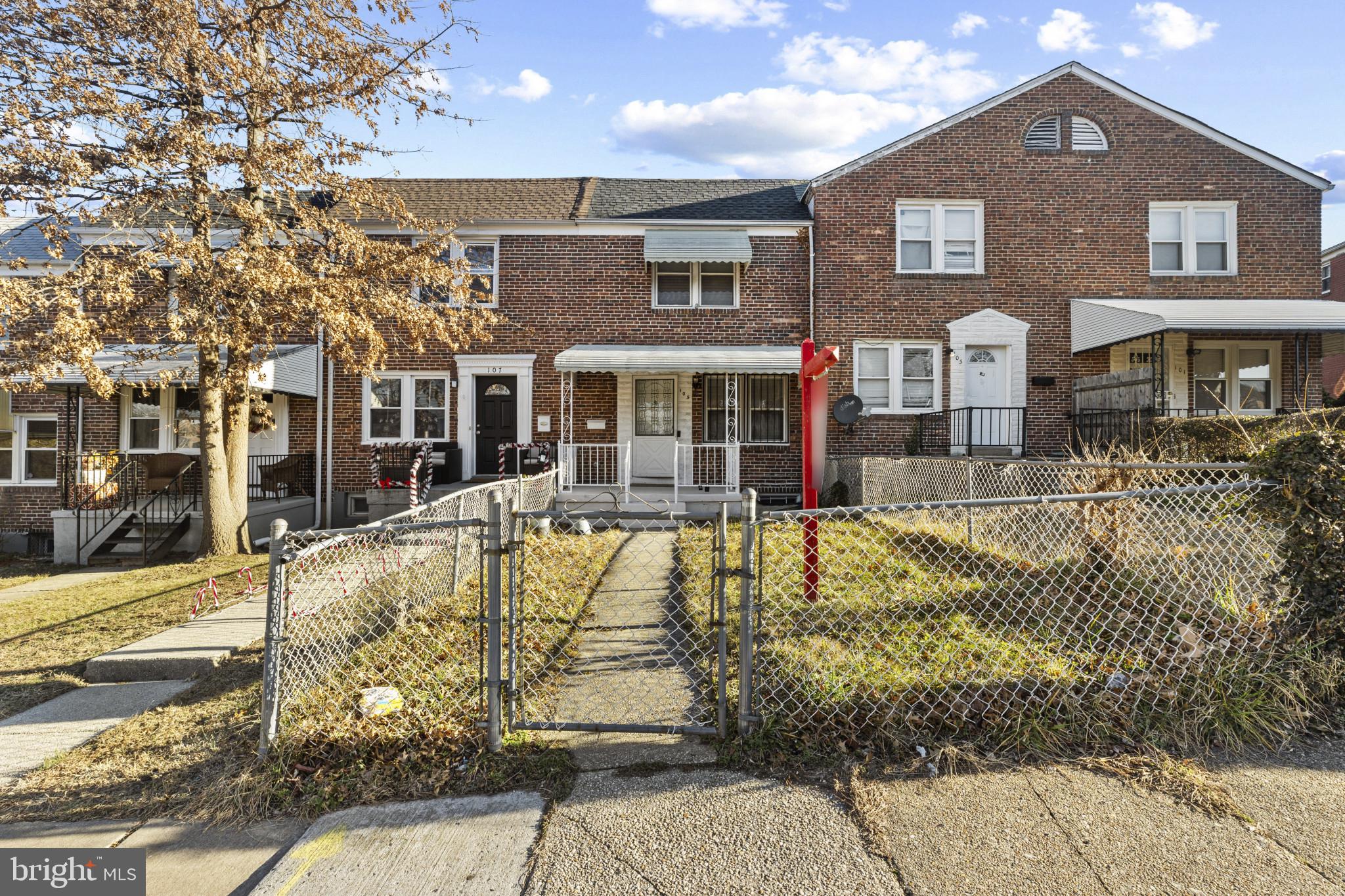 105 Upmanor Road Baltimore, MD 21229 - Photo 2 of 27 a front view of a house with swimming pool