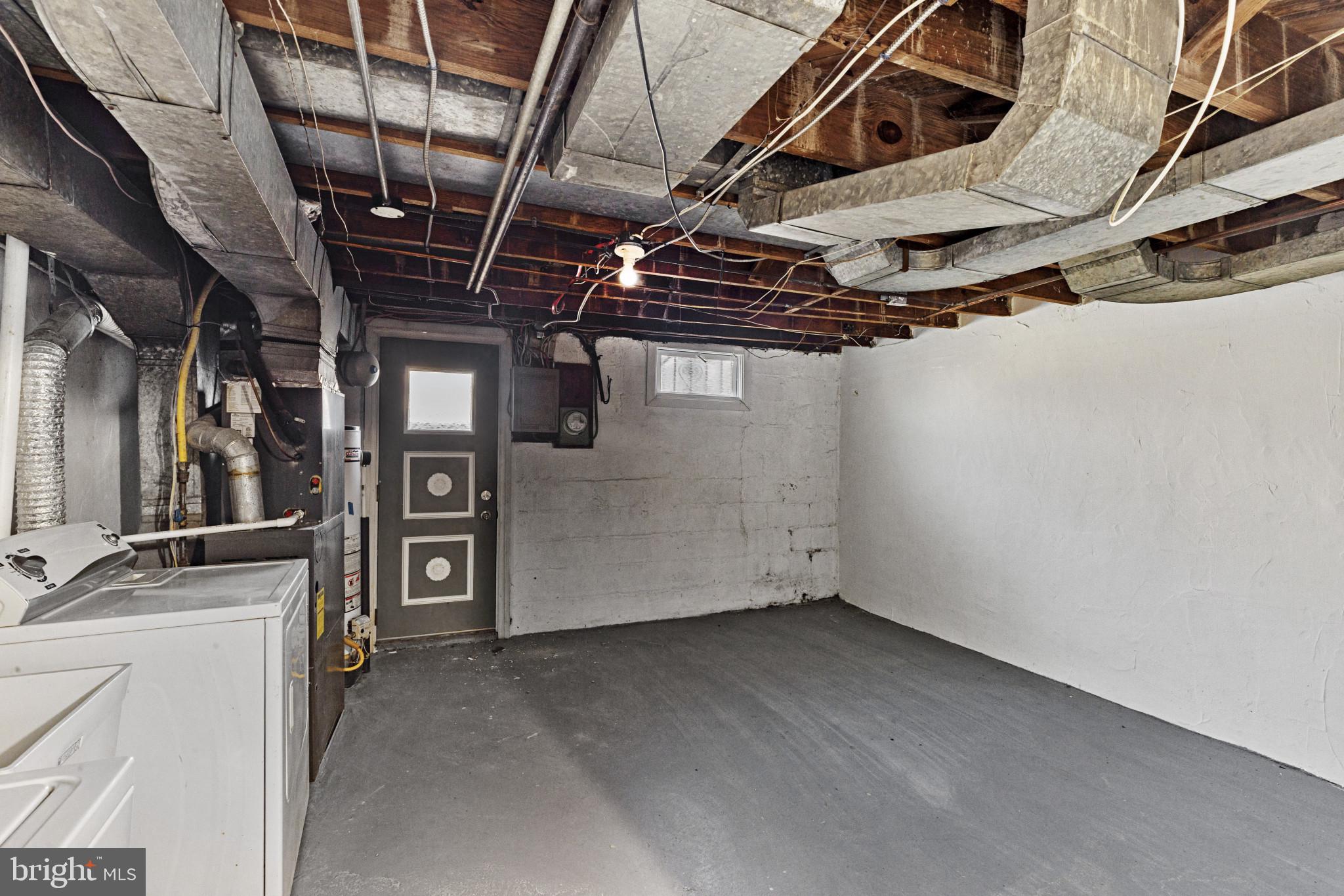 105 Upmanor Road Baltimore, MD 21229 - Photo 24 of 27 a view of a room with gym equipment