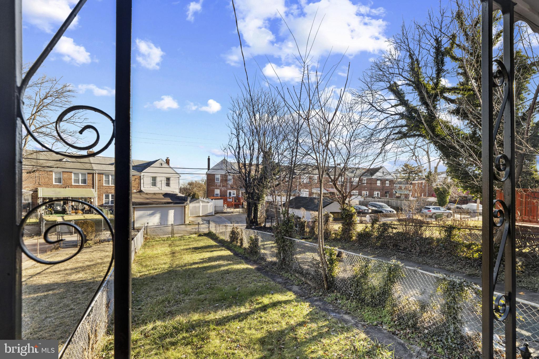 105 Upmanor Road Baltimore, MD 21229 - Photo 25 of 27 a view of water pond with sitting area