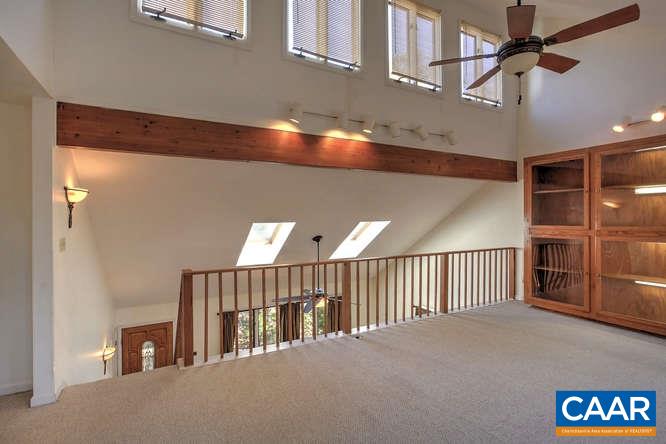 20 Begum Road Palmyra, VA 22963 - Photo 28 of 32 a view of staircase with lots of frames on wall and a window