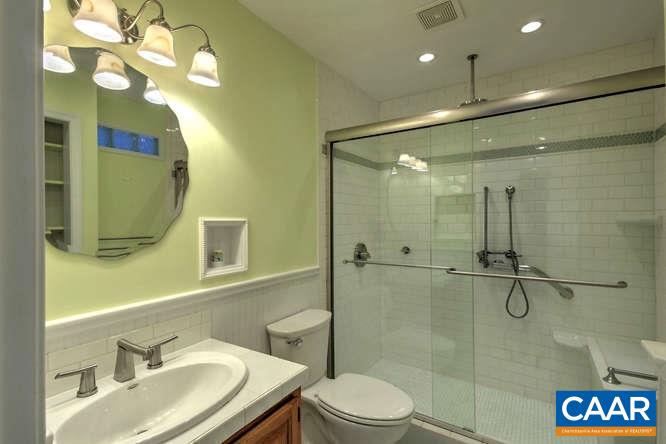 20 Begum Road Palmyra, VA 22963 - Photo 30 of 32 a bathroom with a sink vanity granite and a mirror