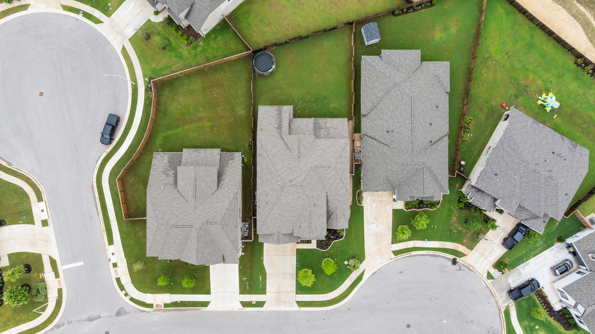 515 Watershield Cove Georgetown, TX 78633 - Photo 38 of 40 An aerial perspective reveals a quiet cul-de-sac neighborhood with manicured lawns and spacious driveways.