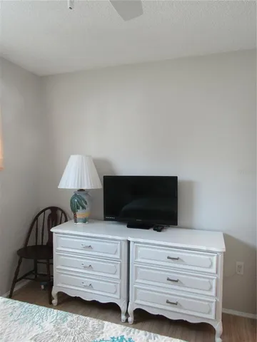 a room with furniture and a flat screen tv