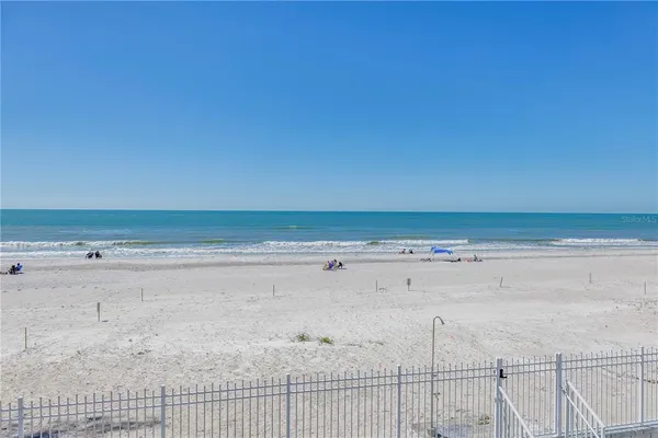 a view of beach and an ocean view