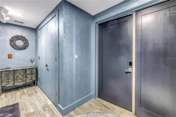 a view of a hallway with elevator