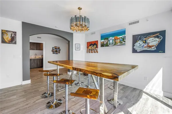 a room with furniture and a chandelier