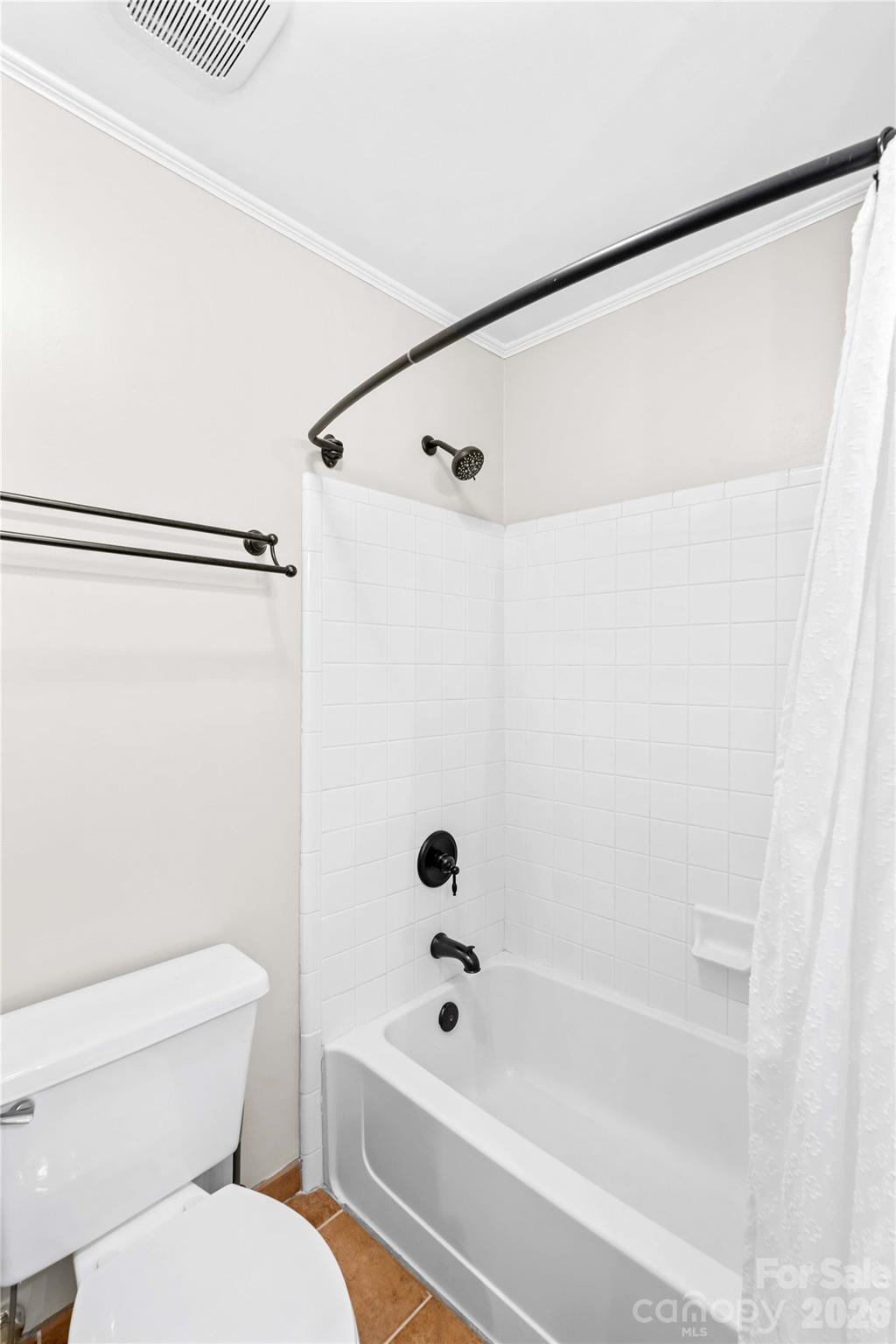 18797 Vineyard Point Lane Cornelius, NC 28031 - Photo 19 of 36 a bathroom with a toilet a sink and a shower