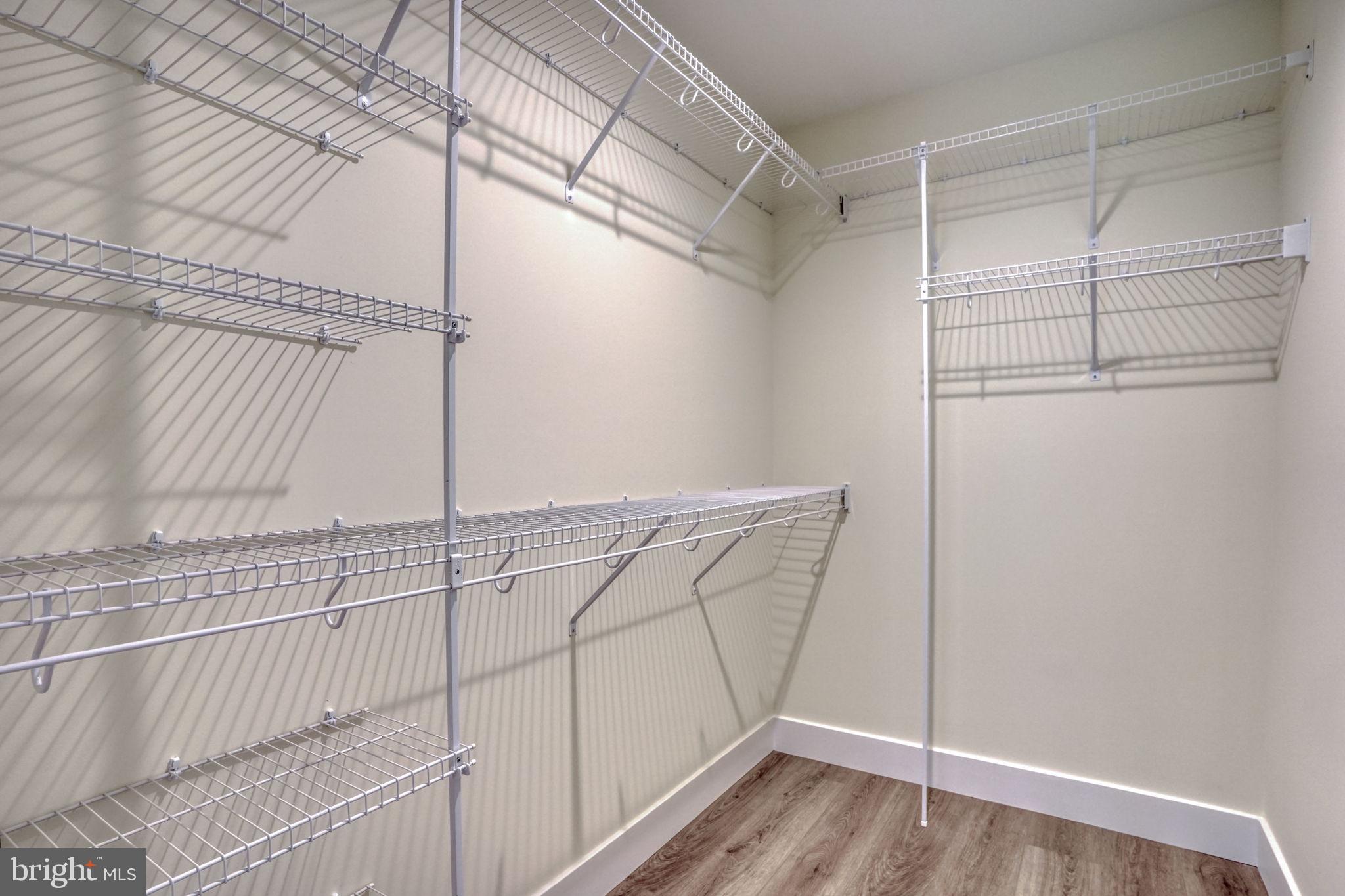 205 Charles Way Georgetown, DE 19947 - Photo 21 of 31 a view of a room with racks on the wall