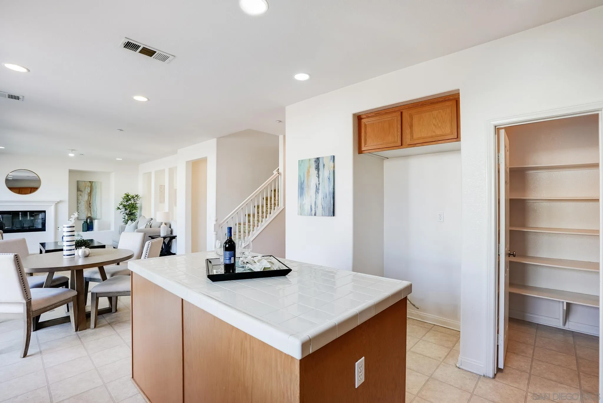 17048 Ralphs Ranch Road San Diego, CA 92127 - Photo 13 of 26 a view of a livingroom with furniture and window