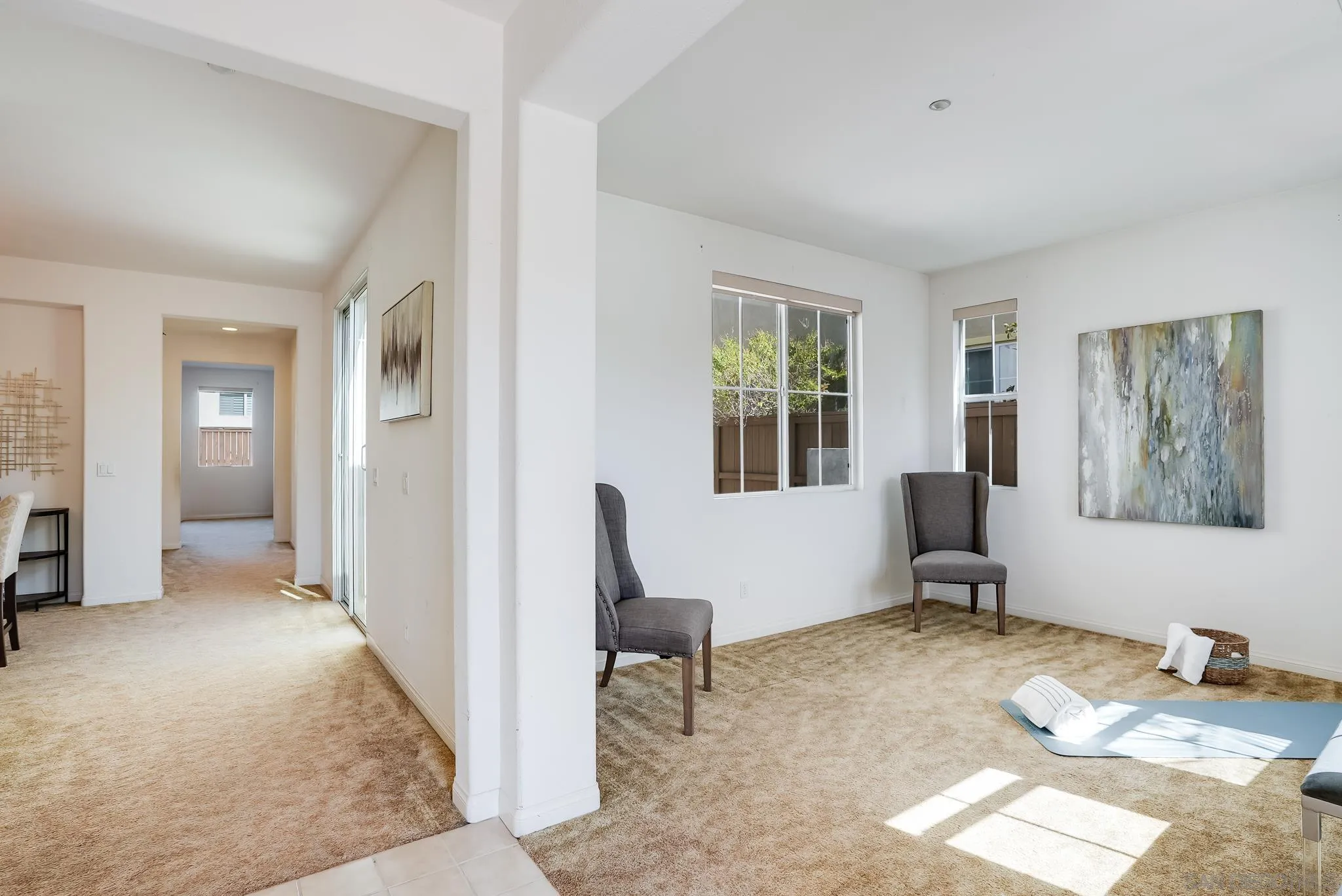 17048 Ralphs Ranch Road San Diego, CA 92127 - Photo 3 of 26 a view of a livingroom with workspace and a couch