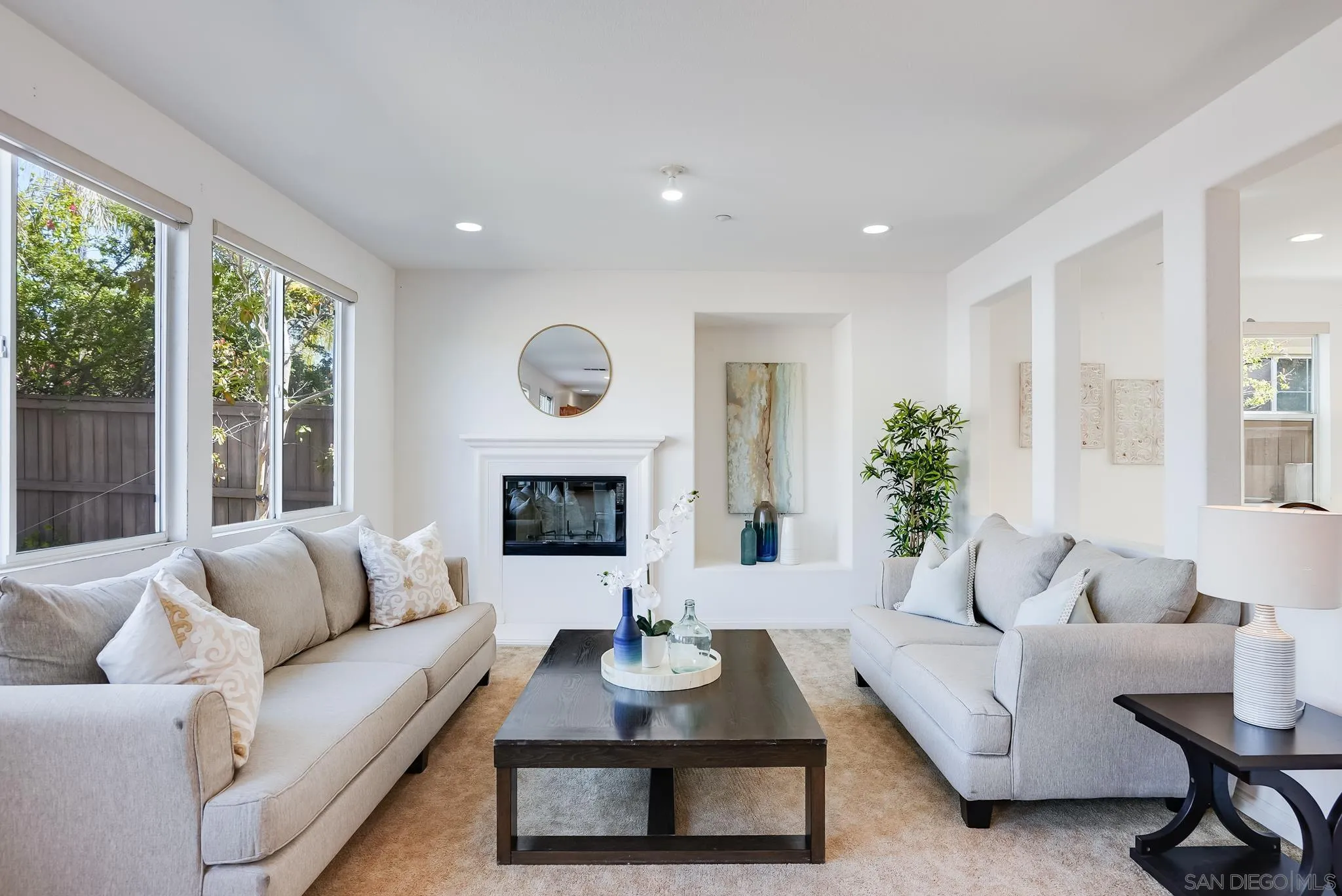 17048 Ralphs Ranch Road San Diego, CA 92127 - Photo 7 of 26 a living room with furniture and a fireplace