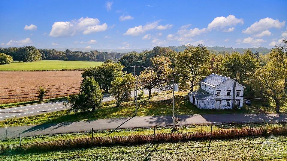 213 Kipp Road Hudson, NY 12534 - Photo 1 of 8 a view of a lake with a house in the background
