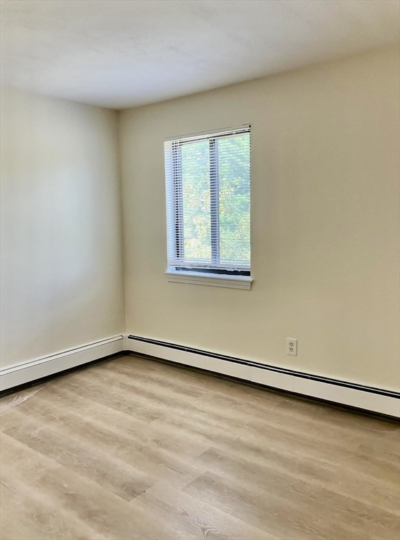 9 Davis Road, Unit C1 Acton, MA 01720 - Photo 12 of 20 an empty room with a window