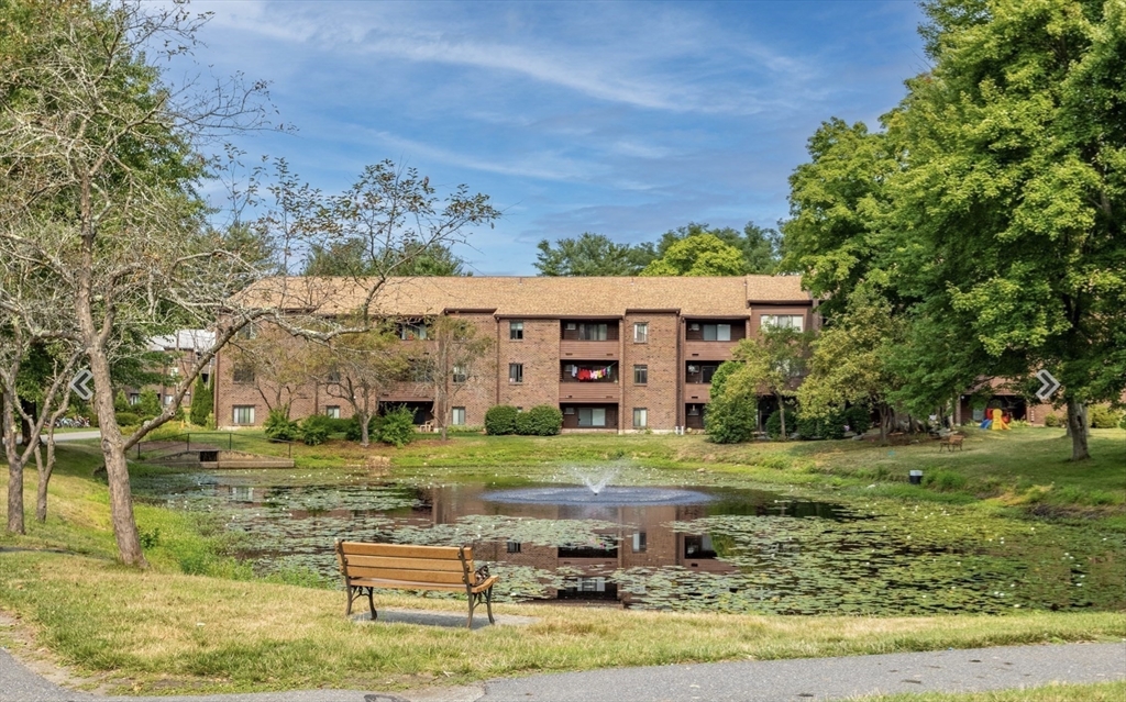 9 Davis Road, Unit C1 Acton, MA 01720 - Photo 16 of 20 a front view of a house with a yard