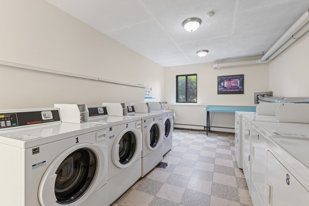 9 Davis Road, Unit C1 Acton, MA 01720 - Photo 19 of 20 a utility room with dryer and washer