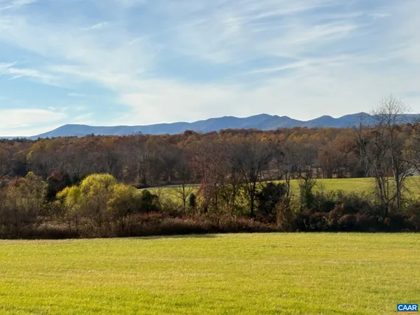 a view of lake with mountain