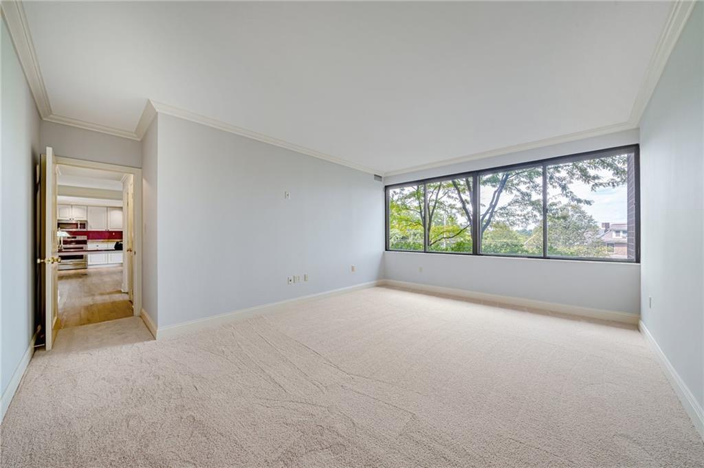 750 Washington Road, Unit 211 Pittsburgh, PA 15228 - Photo 15 of 19 a view of an empty room with a window